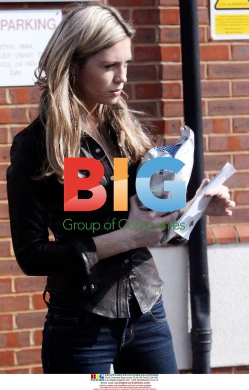 Abigail Clancy with police letter in Surrey
