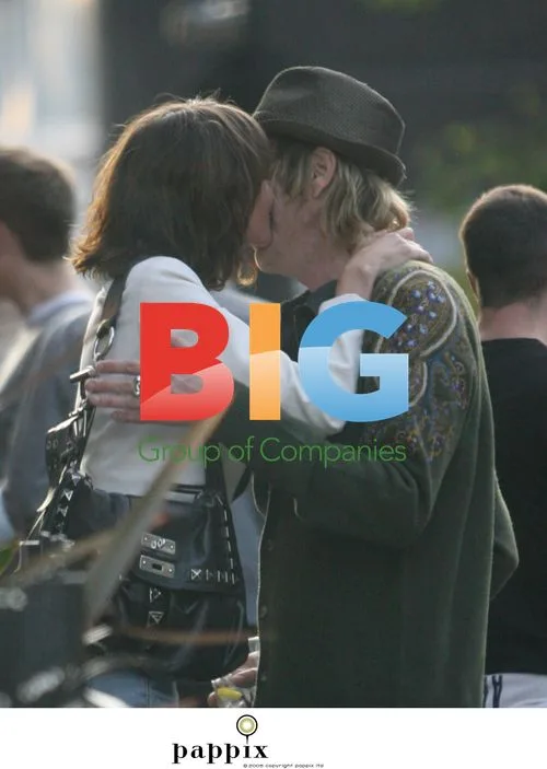 Rhys Ifans with new brunette companion