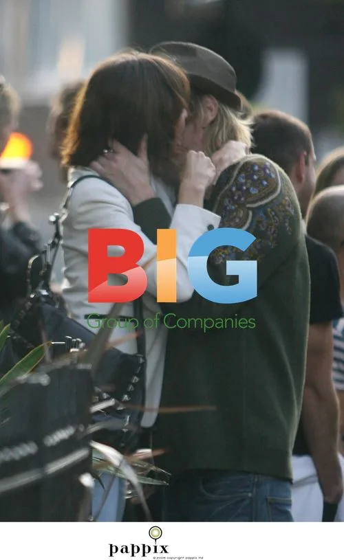 Rhys Ifans with new brunette companion