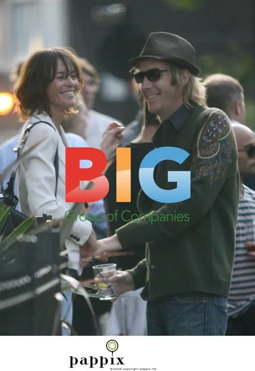 Rhys Ifans with new brunette partner