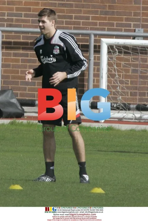 Liverpool football players train for Carling Cup