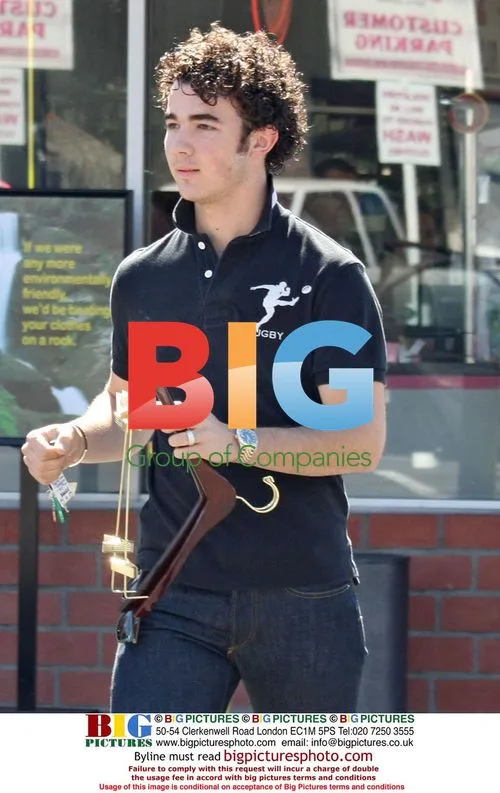 Kevin Jonas Drops Off Clothes