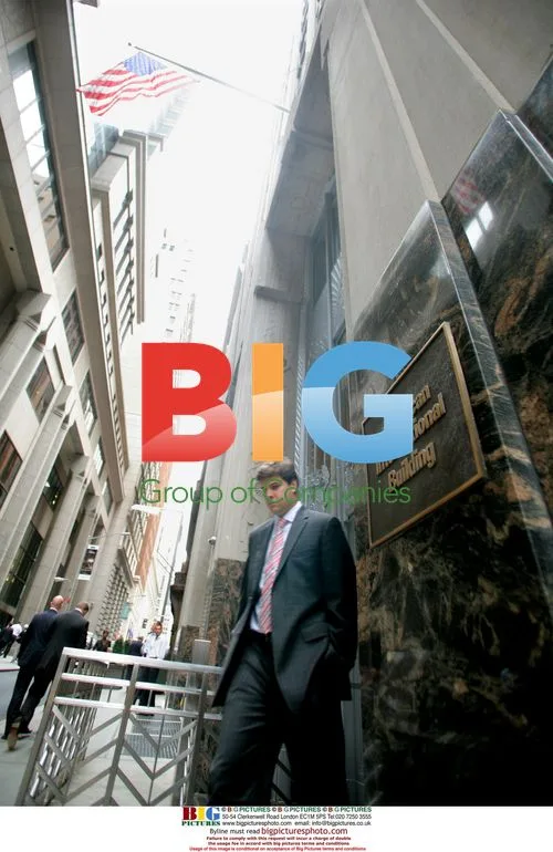 Man exits AIG building after Lehman Brothers collapse