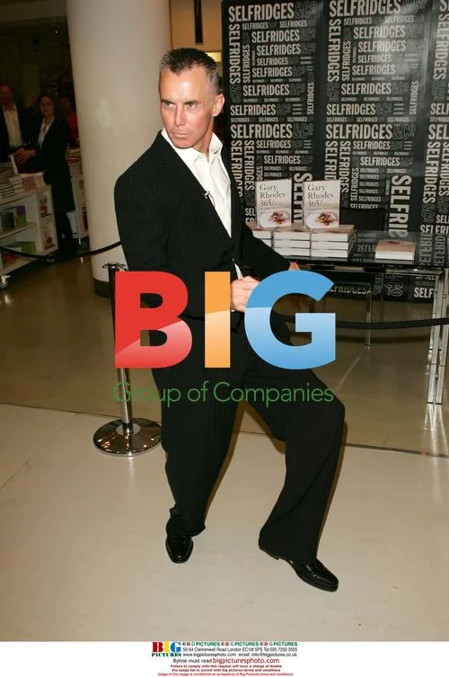 Gary Rhodes signs book, dances with fan at Selfridges