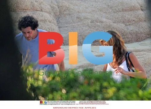 Jennifer Aniston Relaxes on Beach in Mexico