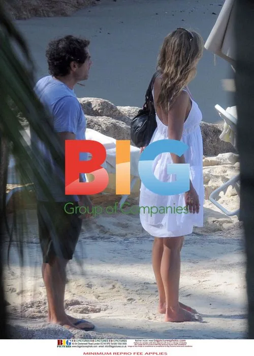 Jennifer Aniston Relaxes on Beach with New Man
