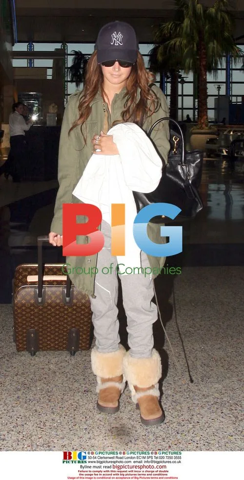 Ashley Tisdale Grabs Bite at LAX
