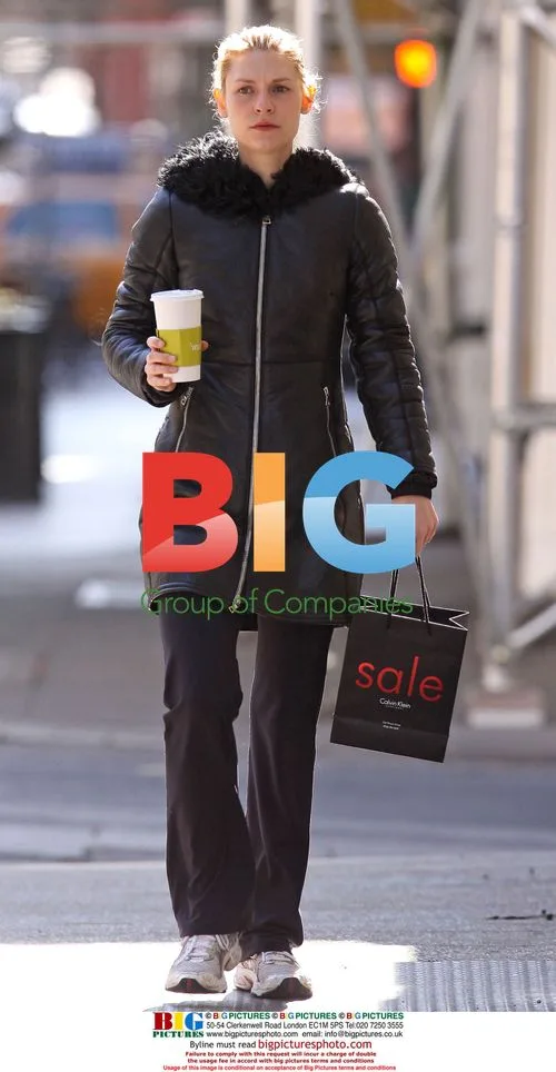 Claire Danes strolls in Soho with coffee