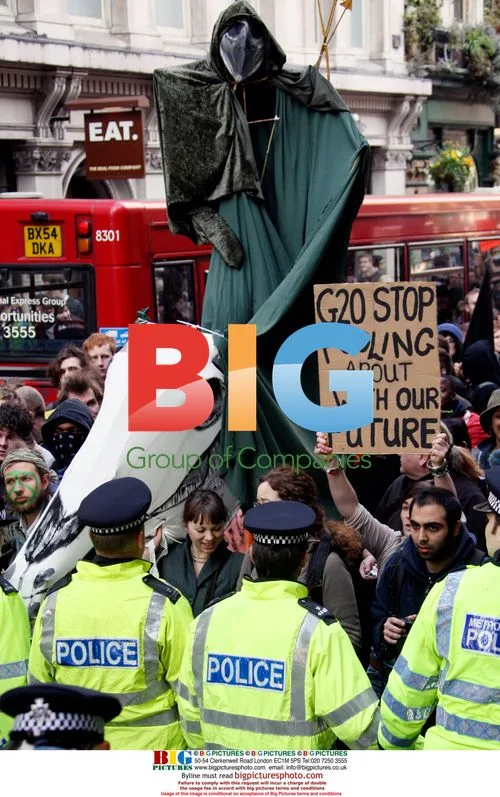Protesters march ahead of G20 Summit, London