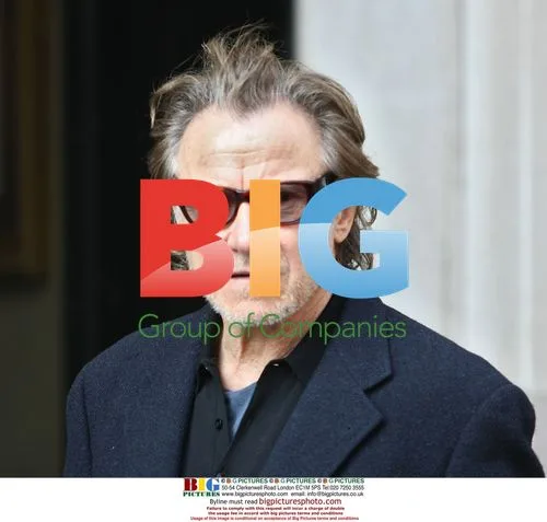 Harvey Keitel and wife leave hotel in Paris