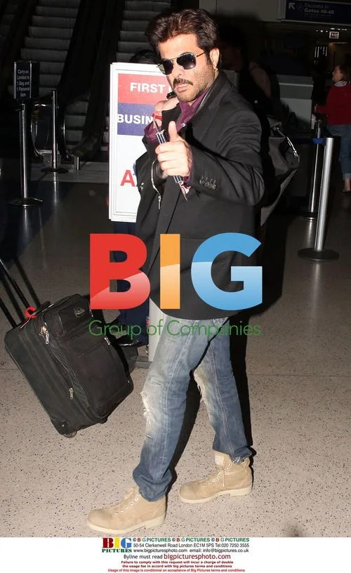 Anil Kapoor Gives Thumbs Up at LAX