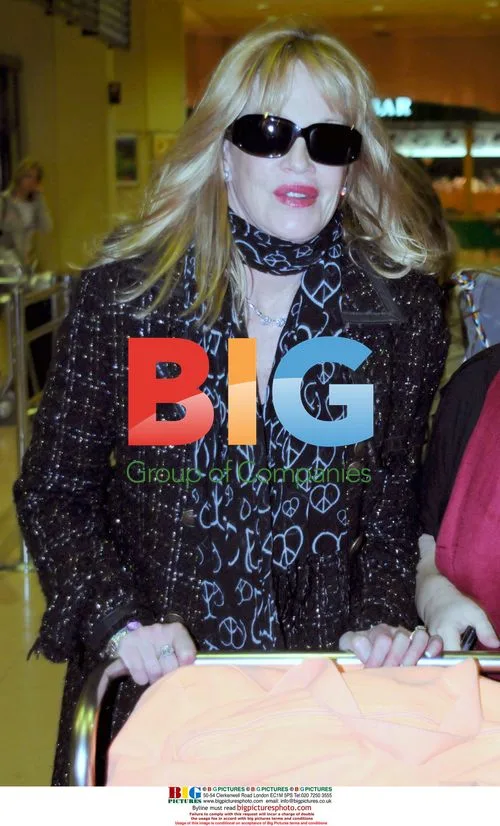 Melanie Griffiths arrives at Malaga airport
