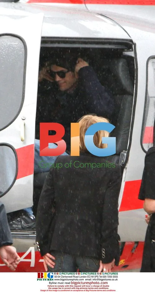 Ashton Kutcher and Demi Moore Arrive at Heli Air