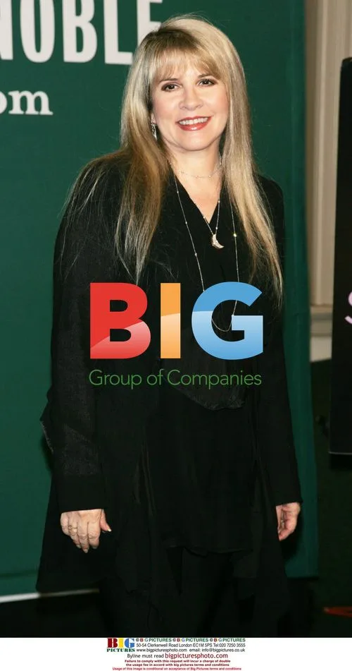 Stevie Nicks poses with fans at NYC event