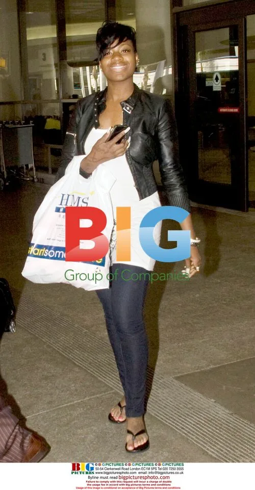 Fantasia Barrino Arrives at LAX with Companion