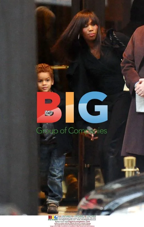 Nicole Coste and son Alexandre leaving Paris