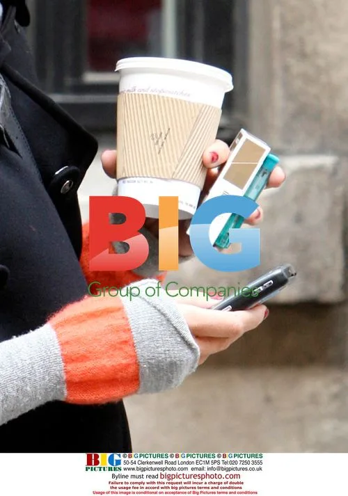 Claudia Winkleman takes cigarette break