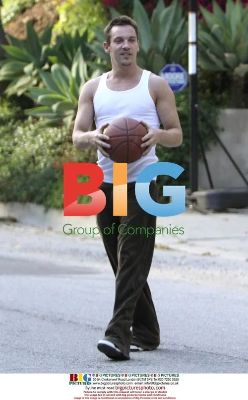 Jonathan Rhys Meyers plays basketball