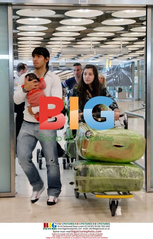 Sergio Aguero and Giannia Maradona with baby