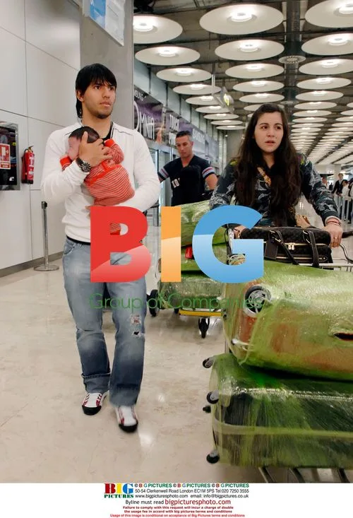Sergio Kun Aguero and Giannia Maradona arrive at Madrid airport