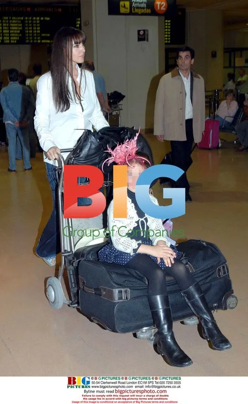 Monica Bellucci and family at Malaga airport