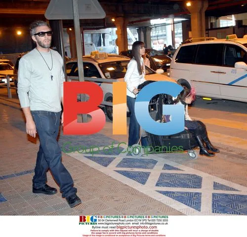 Monica Bellucci and family at Malaga airport