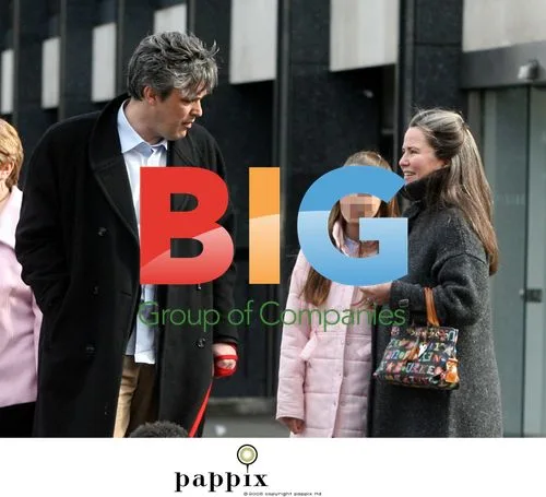 Koo Stark out with daughter and mystery man