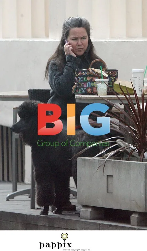 Koo Stark out with daughter and new man