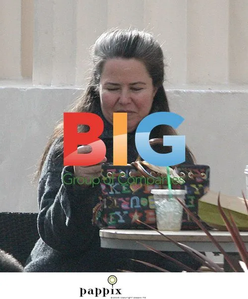Koo Stark spotted with daughter and new man