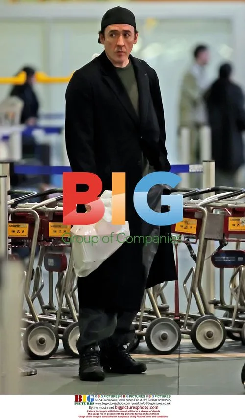Brooke Shields and John Cusack at airport