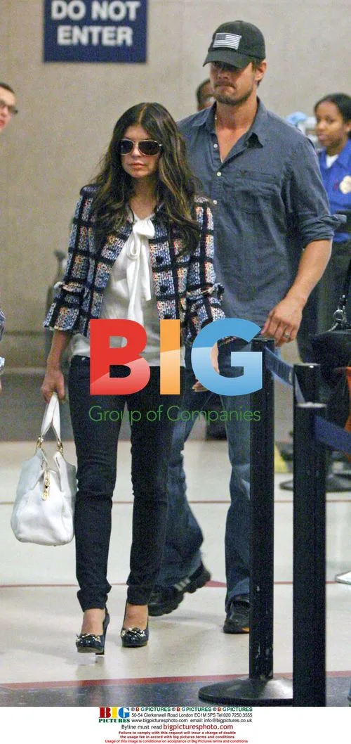 Fergie and Josh Duhamel arrive at LAX