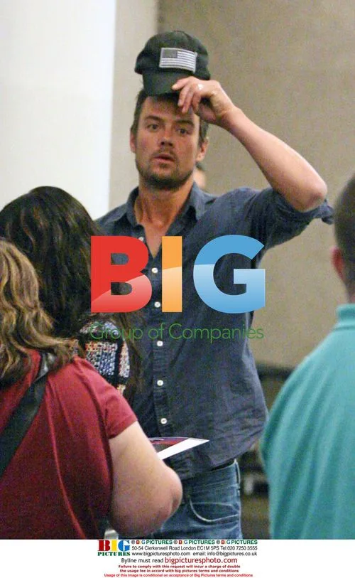 Fergie and Josh Duhamel arrive to LAX