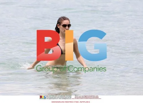 Kelly Brook in Black Bikini on Caribbean Vacation