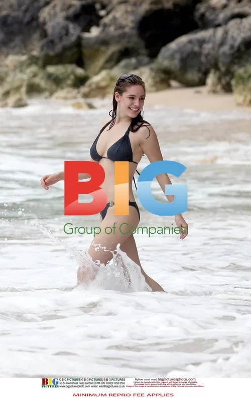 Kelly Brook in Black Bikini on Caribbean Vacation