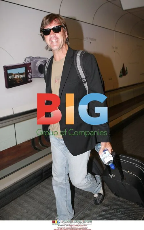 Richard Madeley and Judy Finnigan arrive at Gatwick