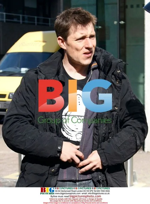 Ben Shepard leaving GMTV studios on a bike
