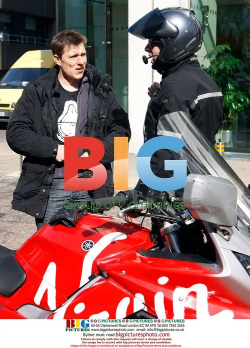 Ben Shepard leaving GMTV studios on bike