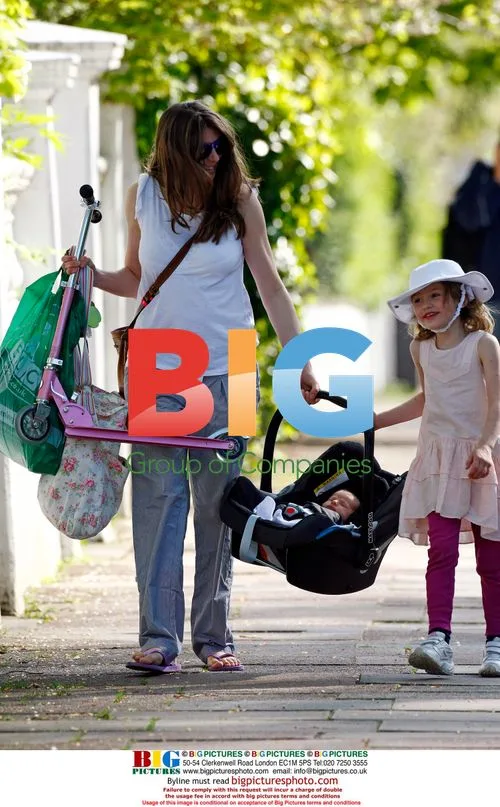 Jools Oliver with daughters in London