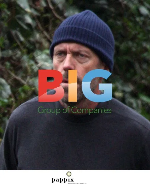 Hugh Laurie Jogs with Dog in London