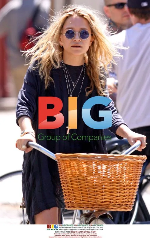 Mary-Kate Olsen rides bike with boyfriend