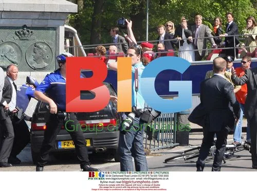 Car Plows Into Queen's Day Parade