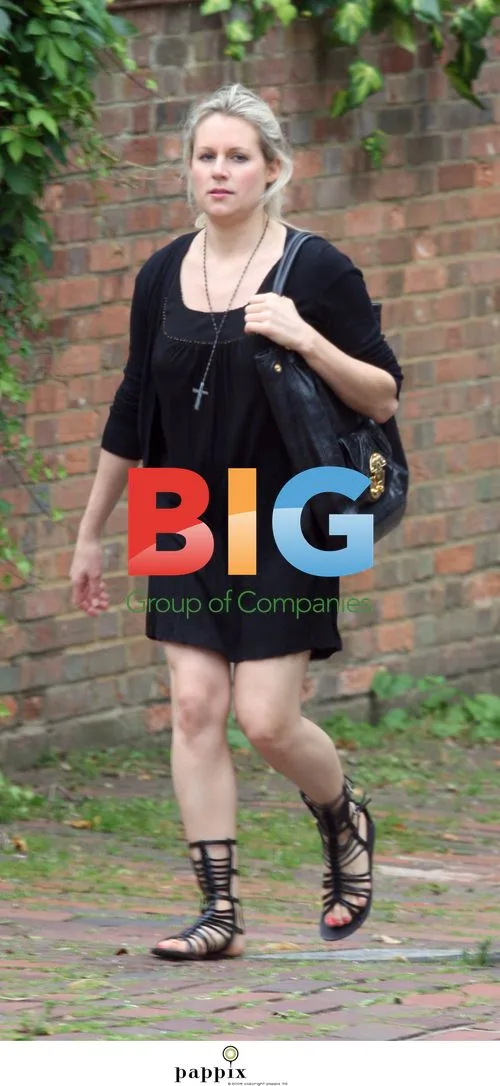 Abigail Titmuss and Companion Out in London