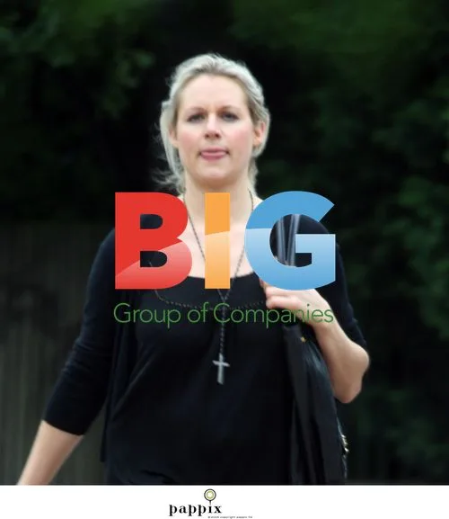 Abigail Titmuss and Companion Stroll in London