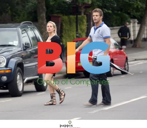 Abigail Titmuss and Companion Stroll in London