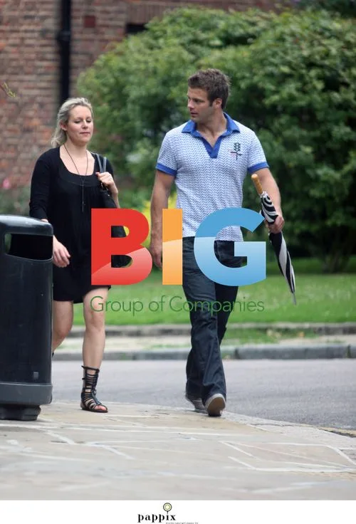 Abigail Titmuss and companion stroll in London