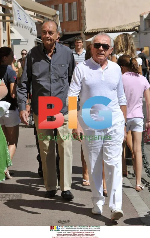 Jacques Chirac strolling with billionaire friends