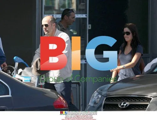 Jason Statham and girlfriend in Nice