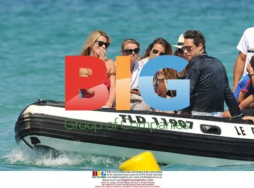 Kate Moss, Jamie Hince, Karen Mulder and Stefano Pilati arrive by dinghy