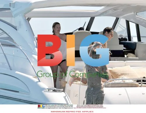 Kate Moss, Jamie Hince, Karen Mulder and Stefano Pilati on yacht