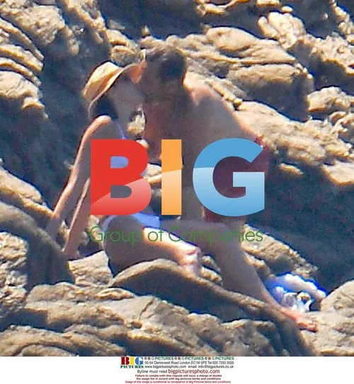Sarkozy Frolicks on Summer Vacation
